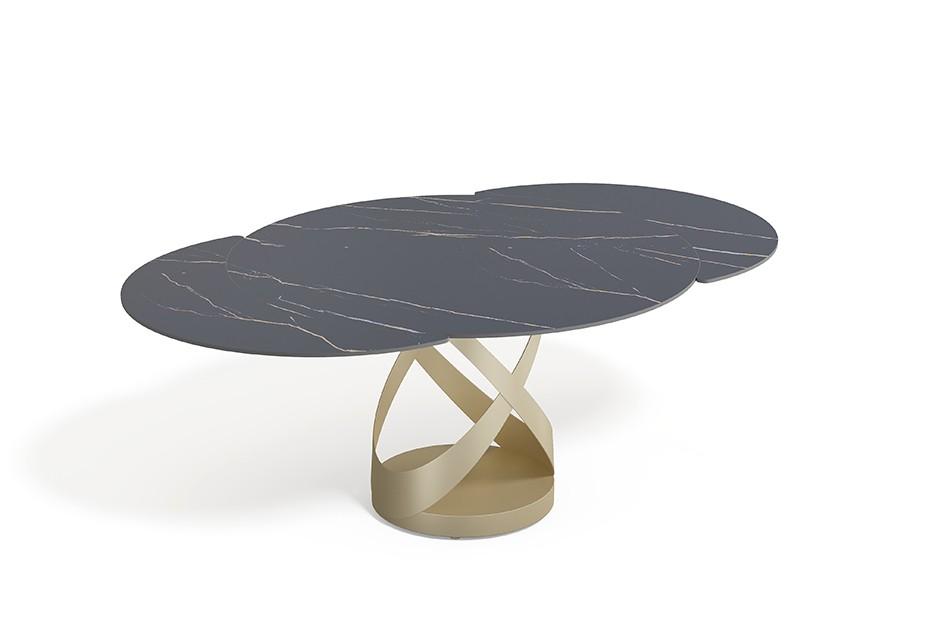 ARIELLA - Table à manger ronde extensible en céramique noir marbrée et pied doré L 120 / 180